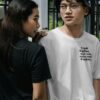 trink kaffee asian couple with black and white t-shirts